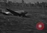 Standbild Douglas C-47 Skytrain Nadzab New Guinea, 1943, aus Sekunde 58 historischem Filmmaterial Videoclip 65675044787
