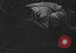 Standbild britischer Soldat Nadzab New Guinea, 1943, aus Sekunde 7 historischem Filmmaterial Videoclip 65675044789