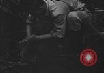 Standbild britischer Soldat Nadzab New Guinea, 1943, aus Sekunde 10 historischem Filmmaterial Videoclip 65675044789