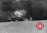 Standbild zwei F6fs Der VF-12 in Flammen auf die USS Randolph (CV-15) Pazifik, 1945, aus Sekunde 10 historischem Filmmaterial Videoclip 65675044901