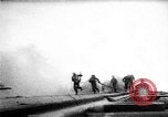Standbild zwei F6fs Der VF-12 in Flammen auf die USS Randolph (CV-15) Pazifik, 1945, aus Sekunde 29 historischem Filmmaterial Videoclip 65675044901