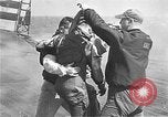 Standbild zwei F6fs Der VF-12 in Flammen auf die USS Randolph (CV-15) Pazifik, 1945, aus Sekunde 39 historischem Filmmaterial Videoclip 65675044901
