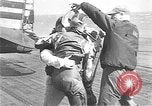 Standbild zwei F6fs Der VF-12 in Flammen auf die USS Randolph (CV-15) Pazifik, 1945, aus Sekunde 40 historischem Filmmaterial Videoclip 65675044901