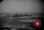 Image of American destroyer underway in heavy seas Pacific Ocean, 1944, second 1 stock footage video 65675044921