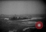 Image of American destroyer underway in heavy seas Pacific Ocean, 1944, second 3 stock footage video 65675044921