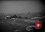 Image of American destroyer underway in heavy seas Pacific Ocean, 1944, second 5 stock footage video 65675044921