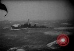 Image of American destroyer underway in heavy seas Pacific Ocean, 1944, second 6 stock footage video 65675044921