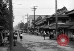 Standbild amerikanische Armee Jeep Koga Japan, 1945, aus Sekunde 9 historischem Filmmaterial Videoclip 65675044960