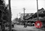 Standbild amerikanische Armee Jeep Koga Japan, 1945, aus Sekunde 11 historischem Filmmaterial Videoclip 65675044960