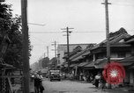 Standbild amerikanische Armee Jeep Koga Japan, 1945, aus Sekunde 20 historischem Filmmaterial Videoclip 65675044960