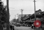 Standbild amerikanische Armee Jeep Koga Japan, 1945, aus Sekunde 21 historischem Filmmaterial Videoclip 65675044960