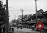 Standbild amerikanische Armee Jeep Koga Japan, 1945, aus Sekunde 24 historischem Filmmaterial Videoclip 65675044960