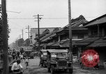Standbild amerikanische Armee Jeep Koga Japan, 1945, aus Sekunde 32 historischem Filmmaterial Videoclip 65675044960