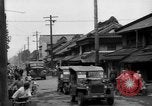Standbild amerikanische Armee Jeep Koga Japan, 1945, aus Sekunde 33 historischem Filmmaterial Videoclip 65675044960