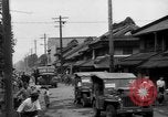 Standbild amerikanische Armee Jeep Koga Japan, 1945, aus Sekunde 34 historischem Filmmaterial Videoclip 65675044960