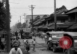 Standbild amerikanische Armee Jeep Koga Japan, 1945, aus Sekunde 36 historischem Filmmaterial Videoclip 65675044960