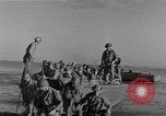 Image of American troop reinforcements and supplies  arriving on Guadalcanal Guadalcanal Solomon Islands, 1943, second 16 stock footage video 65675044980