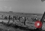 Image of American troop reinforcements and supplies  arriving on Guadalcanal Guadalcanal Solomon Islands, 1943, second 30 stock footage video 65675044980