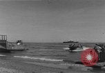 Image of American troop reinforcements and supplies  arriving on Guadalcanal Guadalcanal Solomon Islands, 1943, second 52 stock footage video 65675044980