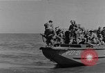 Image of American troop reinforcements and supplies  arriving on Guadalcanal Guadalcanal Solomon Islands, 1943, second 62 stock footage video 65675044980