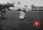Standbild Football Team Praktiken mit mechanisierten Dummies Ventura California USA, 1948, aus Sekunde 48 historischem Filmmaterial Videoclip 65675044997