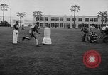 Standbild Football Team Praktiken mit mechanisierten Dummies Ventura California USA, 1948, aus Sekunde 49 historischem Filmmaterial Videoclip 65675044997