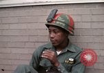 Standbild Detroit Ausschreitungen Michigan United States USA, 1967, aus Sekunde 58 historischem Filmmaterial Videoclip 65675045063