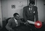Image of African American businessman George Sevelle Los Angeles California USA, 1939, second 3 stock footage video 65675045065