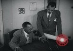 Image of African American businessman George Sevelle Los Angeles California USA, 1939, second 4 stock footage video 65675045065