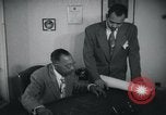 Image of African American businessman George Sevelle Los Angeles California USA, 1939, second 5 stock footage video 65675045065