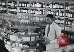 Immagine di Americani africani in business United States USA, 1950, secondo 14 filmato di repertorio 65675045069