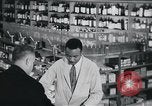 Immagine di Americani africani in business United States USA, 1950, secondo 16 filmato di repertorio 65675045069