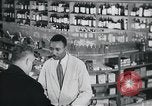 Immagine di Americani africani in business United States USA, 1950, secondo 17 filmato di repertorio 65675045069