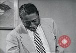Immagine di Americani africani in business United States USA, 1950, secondo 45 filmato di repertorio 65675045069