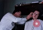 Image eye et les examens dentaires United States USA, 1941, de la seconde 3 séquences d'archives historiques vidéo 65675045081