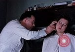 Image eye et les examens dentaires United States USA, 1941, de la seconde 4 séquences d'archives historiques vidéo 65675045081
