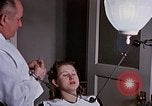Image eye et les examens dentaires United States USA, 1941, de la seconde 62 séquences d'archives historiques vidéo 65675045081