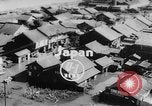 Image of typhoon Japan, 1953, second 1 stock footage video 65675045087