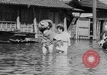 Image of typhoon Japan, 1953, second 14 stock footage video 65675045087