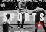 Image of professional wrestling match Cleveland Ohio USA, 1950, second 3 stock footage video 65675045098