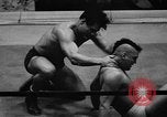 Image of professional wrestling match Cleveland Ohio USA, 1950, second 27 stock footage video 65675045098