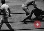 Image of professional wrestling match Cleveland Ohio USA, 1950, second 44 stock footage video 65675045098