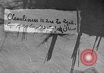 Image of scenes of Indian people at work, school and worship India, 1946, second 5 stock footage video 65675045102