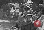 Image of scenes of Indian people at work, school and worship India, 1946, second 7 stock footage video 65675045102