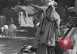 Image of scenes of Indian people at work, school and worship India, 1946, second 11 stock footage video 65675045102