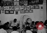 Image of scenes of Indian people at work, school and worship India, 1946, second 12 stock footage video 65675045102