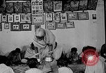 Image of scenes of Indian people at work, school and worship India, 1946, second 13 stock footage video 65675045102