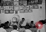Image of scenes of Indian people at work, school and worship India, 1946, second 14 stock footage video 65675045102