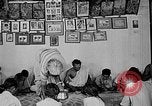 Image of scenes of Indian people at work, school and worship India, 1946, second 15 stock footage video 65675045102