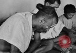Image of scenes of Indian people at work, school and worship India, 1946, second 18 stock footage video 65675045102